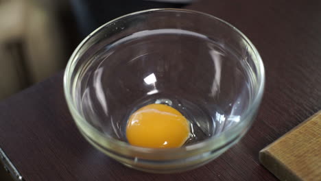 Cooking-food.-Fresh-organic-eggs-falling-into-bowl.-Food-ingredient